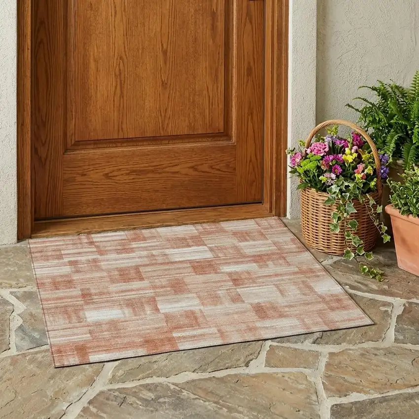 Copper And Salmon Striped Washable Indoor Outdoor Area Rug Photo 1
