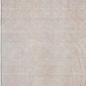 Photo of Copper And Silver Abstract Washable Area Rug With UV Protection