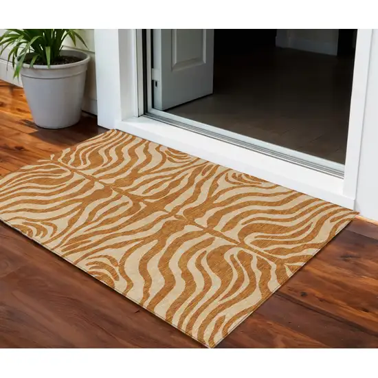 Copper And Tan Animal Print Washable Indoor Outdoor Area Rug Photo 1