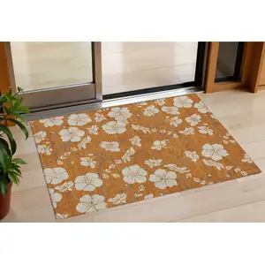 Photo of Copper Beige And Brown Floral Washable Indoor Outdoor Area Rug