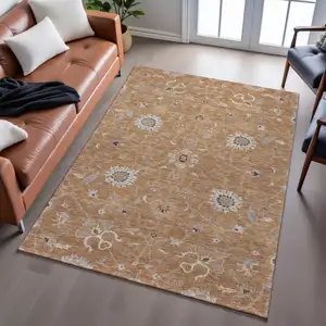 Photo of Copper Beige And Denim Blue Floral Washable Area Rug With UV Protection