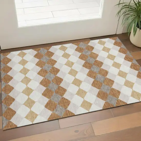 Copper Beige And Ivory Geometric Washable Area Rug With UV Protection Photo 1
