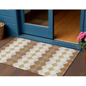 Photo of Copper Beige And Ivory Geometric Washable Indoor Outdoor Area Rug
