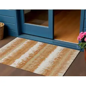 Photo of Copper Beige And Ivory Striped Washable Indoor Outdoor Area Rug