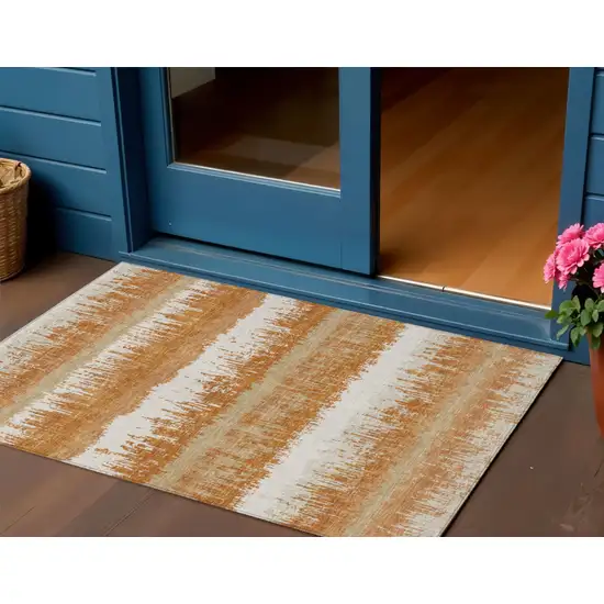 Copper Beige And Ivory Striped Washable Indoor Outdoor Area Rug Photo 1