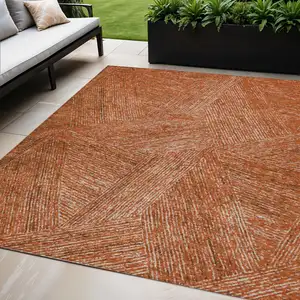 Photo of Copper Brown And Beige Abstract Washable Indoor Outdoor Area Rug
