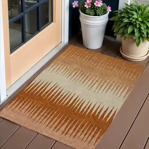 Photo of Copper Brown And Beige Striped Washable Indoor Outdoor Area Rug