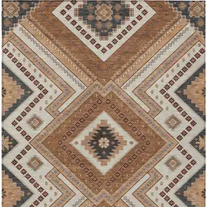 Photo of Copper Brown And Beige Tribal Washable Indoor Outdoor Area Rug