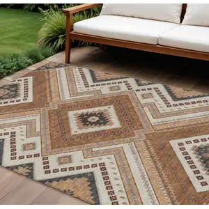 Photo of Copper Brown And Beige Tribal Washable Indoor Outdoor Area Rug