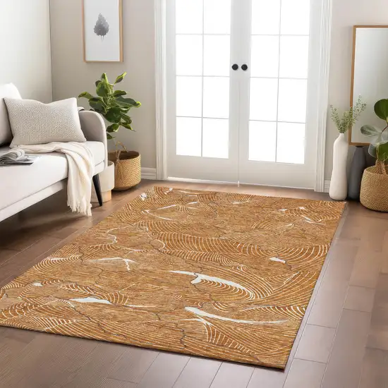 Copper Brown And Ivory Abstract Washable Indoor Outdoor Area Rug Photo 9