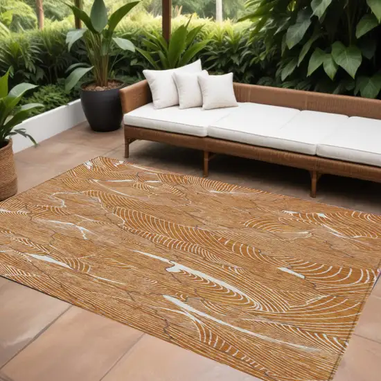 Copper Brown And Ivory Abstract Washable Indoor Outdoor Area Rug Photo 1