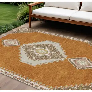 Photo of Copper Brown And Ivory Oriental Washable Indoor Outdoor Area Rug