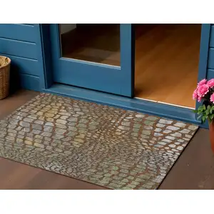 Photo of Copper Gold And Brown Abstract Washable Indoor Outdoor Area Rug