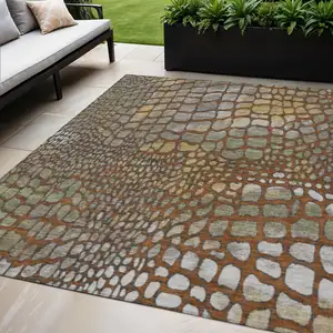 Photo of Copper Gold And Brown Abstract Washable Indoor Outdoor Area Rug