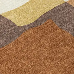 Photo of Copper Gold And Brown Abstract Washable Indoor Outdoor Area Rug