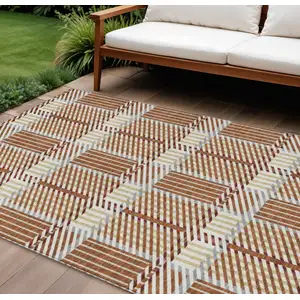 Photo of Copper Gold And Gray Plaid Washable Indoor Outdoor Area Rug