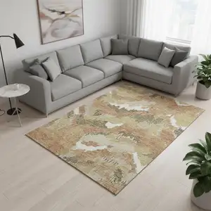 Photo of Copper Gold And Ivory Abstract Washable Area Rug With UV Protection