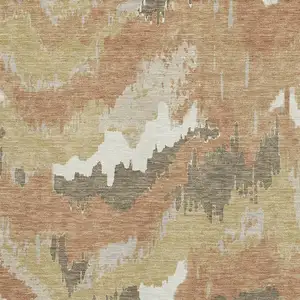 Photo of Copper Gold And Ivory Abstract Washable Area Rug With UV Protection