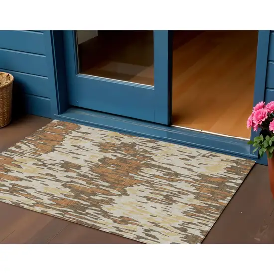 Copper Gold And Ivory Striped Washable Indoor Outdoor Area Rug Photo 1