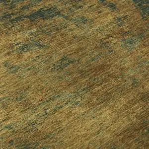 Photo of Copper Gold And Teal Abstract Washable Area Rug With UV Protection