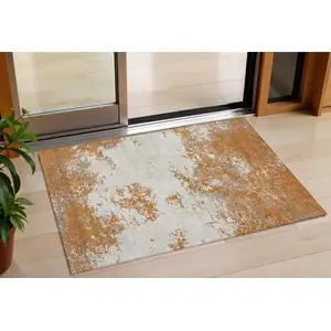 Photo of Copper Gray And Beige Abstract Washable Indoor Outdoor Area Rug