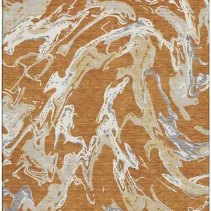 Photo of Copper Gray And Ivory Abstract Washable Area Rug With UV Protection