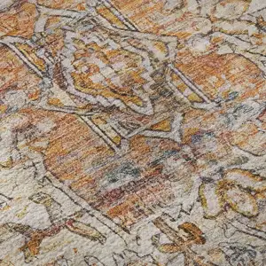 Photo of Copper Gray And Ivory Oriental Washable Area Rug With UV Protection