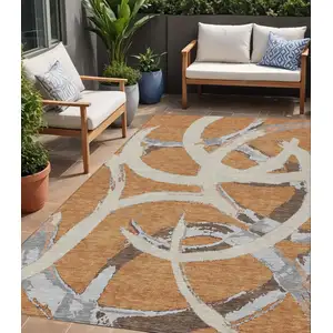 Photo of Copper Ivory And Gray Abstract Washable Indoor Outdoor Area Rug