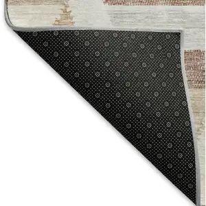 Photo of Copper Ivory And Gray Geometric Washable Area Rug With UV Protection
