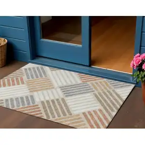 Photo of Copper Ivory And Rust Geometric Washable Indoor Outdoor Area Rug