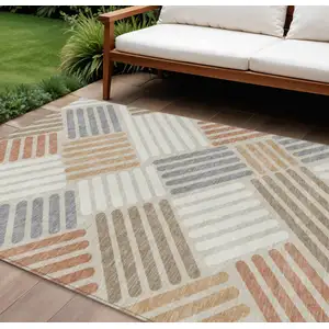 Photo of Copper Ivory And Rust Geometric Washable Indoor Outdoor Area Rug