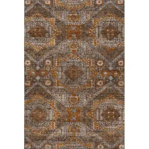 Photo of Copper Rust And Beige Abstract Geometric Washable Area Rug With UV Protection
