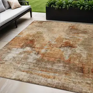 Photo of Copper Rust And Beige Abstract Washable Indoor Outdoor Area Rug