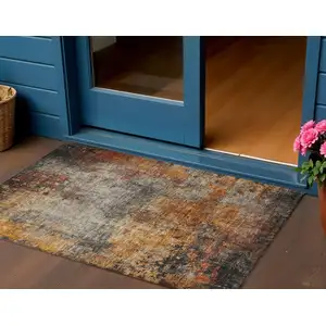 Photo of Copper Terra Cotta And Black Abstract Washable Indoor Outdoor Area Rug
