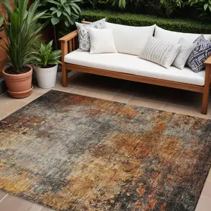 Photo of Copper Terra Cotta And Black Abstract Washable Indoor Outdoor Area Rug