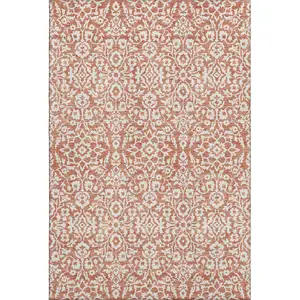 Photo of Coral And Beige Damask Washable Area Rug With UV Protection