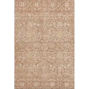 Photo of Coral And Beige Floral Washable Area Rug With UV Protection