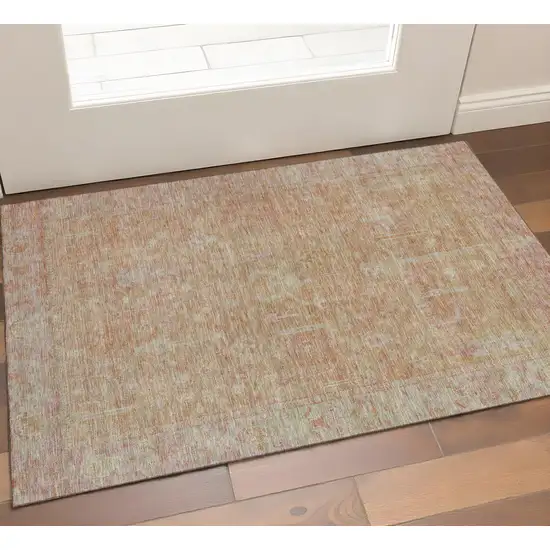 Coral And Beige Oriental Washable Area Rug With UV Protection Photo 1