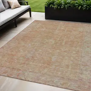 Photo of Coral And Beige Oriental Washable Indoor Outdoor Area Rug