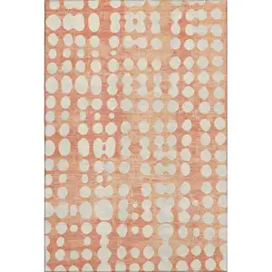 Photo of Coral And Beige Polka Dot Washable Area Rug With UV Protection