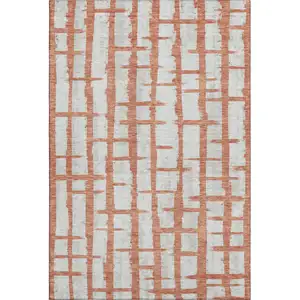 Photo of Coral And Beige Striped Washable Area Rug With UV Protection