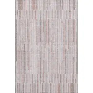 Photo of Coral And Beige Striped Washable Area Rug With UV Protection