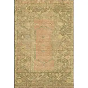 Photo of Coral And Gold Oriental Washable Area Rug With UV Protection