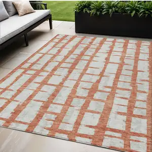 Photo of Coral And Gray Striped Washable Indoor Outdoor Area Rug