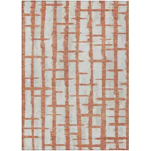 Photo of Coral And Gray Striped Washable Indoor Outdoor Area Rug