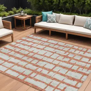 Photo of Coral And Gray Striped Washable Indoor Outdoor Area Rug
