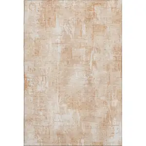 Photo of Coral And Ivory Abstract Washable Area Rug With UV Protection