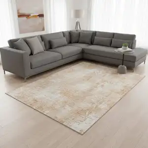 Photo of Coral And Ivory Abstract Washable Area Rug With UV Protection