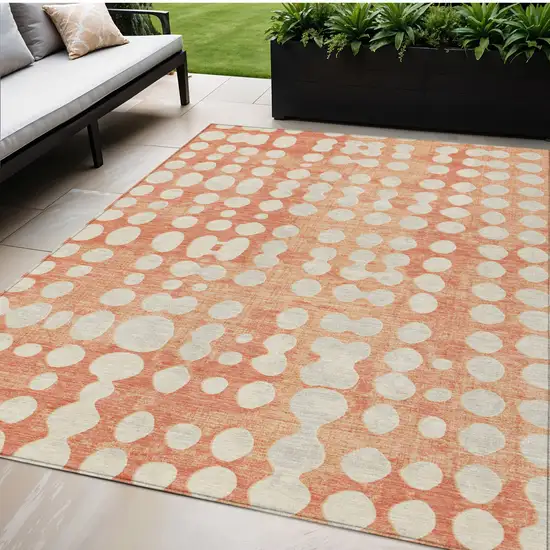 Coral And Ivory Abstract Washable Indoor Outdoor Area Rug Photo 1