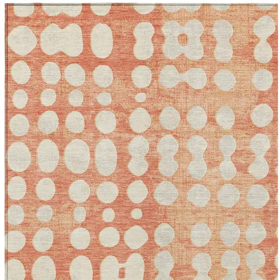 Coral And Ivory Abstract Washable Indoor Outdoor Area Rug Photo 7